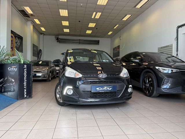 Image for 2014 Hyundai i10 1.0 Deluxe Auto 4DR. Irish Owned Car, NCT & TAX, 2Keys, Bluetooth, MFSW, Air Conditioning, Irish Radio, Alloy Wheels, Folding Rear Seats, Luggage Cover, USB/AUX and more.
