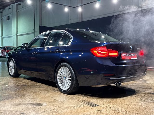 Image for 2016 BMW 3 Series 2.0L AUTOMATIC HYBRID - E LUXURY - FULL BLACK LEATHER - FACTORY ALLOYS - REAR CAMERA - HEATED SEATS - MULTI FUNCTION STEERING WHEEL
