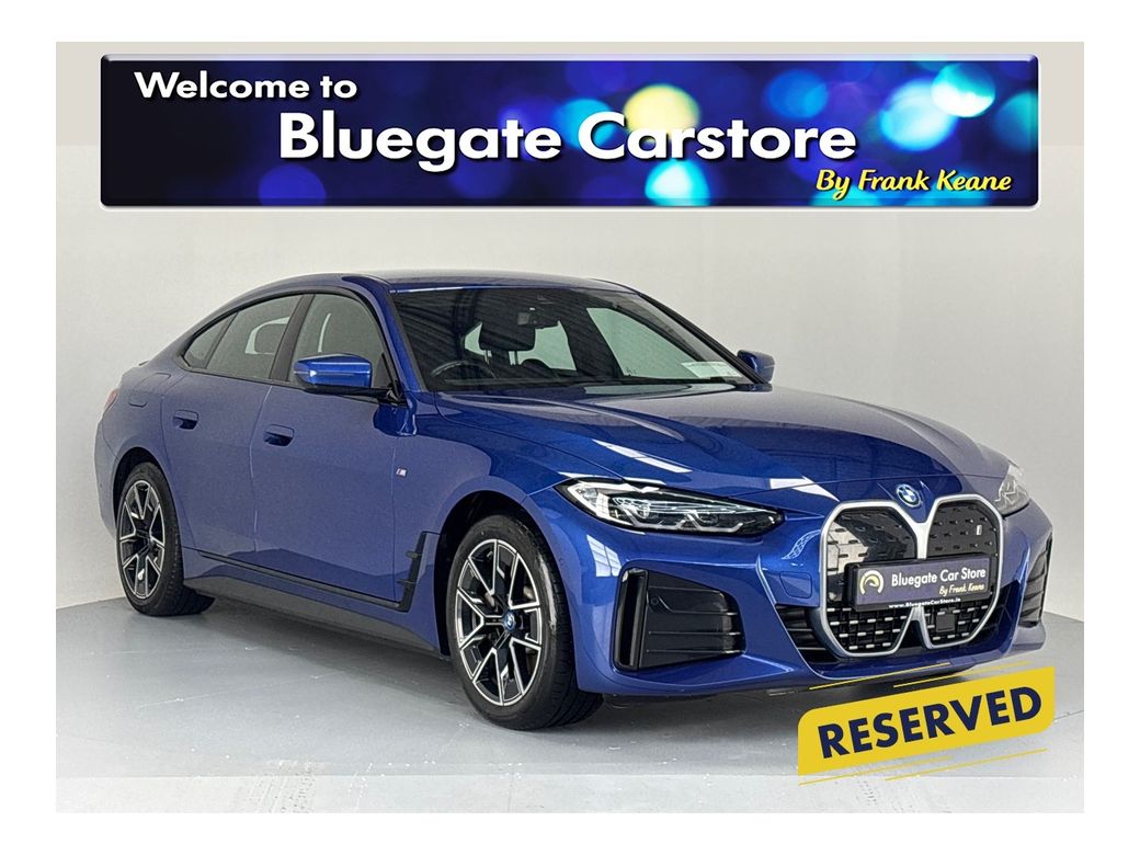 Image for 2022 BMW i4 EDRIVE40 M SPORT **LEATHER HEATED SEATS**MULTIFUNCTIONAL STEERING WHEEL**FULL DIGITAL DASH**CRUISE CONTROL**APPLE CAR PLAY**DRIVE MODES**AUTO LIGHTS**AUTO HOLD**ELECTRIC TAILGATE**ISOFIX**