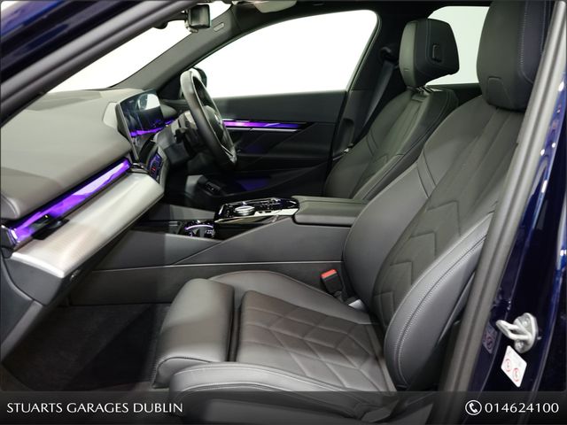 Image for 2026 BMW 5 Series 2 X PACKS AND PANORAMIC GLASS ROOF: TECH PLUS PACK, COMFORT PACK AND 20” 938 STAR ALLOYS, TANZANITE BLUE METALLIC WITH BLACK VEGANZA INTERIOR