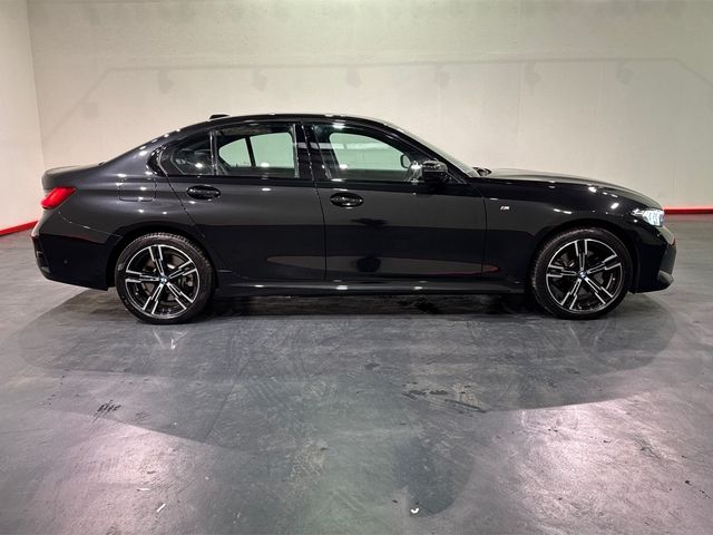 Image for 2025 BMW 3 Series 330E BLACK SAPPHIRE M SPORT SALOON – 18’’ FACTORY ALLOYS – M PERFOMANCE TEX – CRUISE CONTROL - HEATED SEATS – DIGITAL DISPLAY – FLAT BOTTOM M SPORT STEERING WHEEL – REAR CAMERA/PARKING