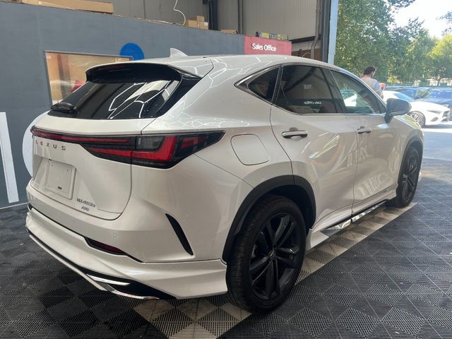Image for 2023 Lexus NX 450H+ 2023 LEXUS NX 4WD NX450H+ VERSION L 2.5 AUTOMATIC / CRUISE CONTROL / PARKING CAMERA / ELECTRIC MEMORY & HEATED SEATS / PADDLE SHIFTERS / AMBIENT LIGHTS / APPLE CARPLAY / HEATED STEERING WHEEL AND MOR
