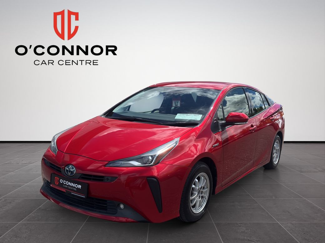 Image for 2019 Toyota Prius Red Prius energy — passing petrol stations like they offended you