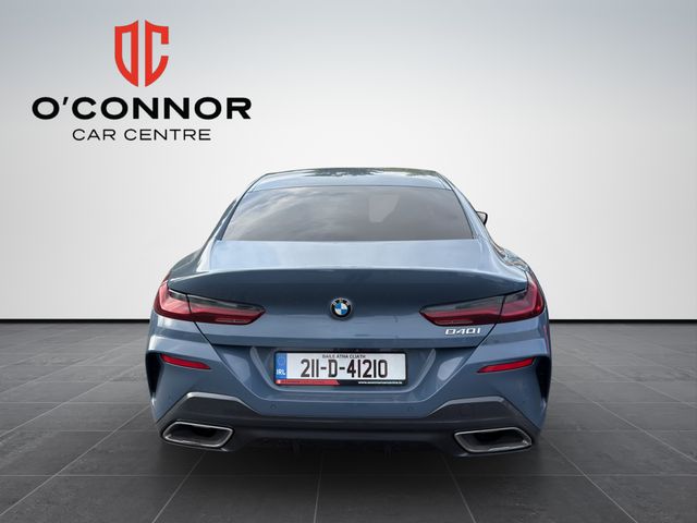 Image for 2021 BMW 8 Series Barcelona Blue, cream leather, big spec — this 840i is pure class.