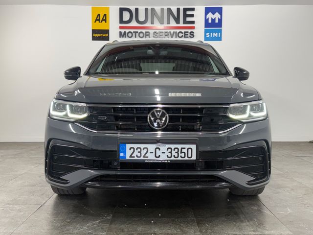 Image for 2023 Volkswagen Tiguan **R-LINE**360 CAMERA**PANORAMIC ROOF**360 PARKING SENSORS**20" BLACK ALLOY WHEELS**FULL LEATHER SEATS**DRIVER AND PASSENGER MEMORY SEATS**HEATED FRONT SEATS**HEATED STEERING WHEEL**IQ HEADLAMPS**2 KEY