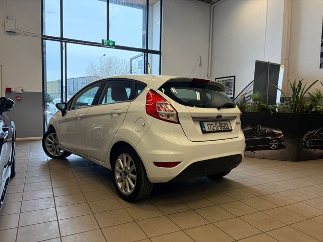 Image for 2017 Ford Fiesta MCA Titanium 1.25 60PS M5 4DR Irish Owned Car With NCT & Tax, Parking Sensor, CD Player, 2 Keys, Air Conditioning, Irish Radio, Service History, Folding Rear Seats, Alloy Wheels, and more.