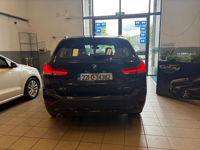 Image for 2022 BMW X1 F48 Xdrive25e Sport 5 DR Auto. Half Leather, NCT & Tax, MFSW, Parking Sensors, Climate Control, Cruise Control, Sat Nav, Motorised Tailgate, Irish Radio, Bluetooth, USBC, Folding Rear Seats, and more.