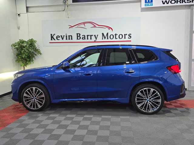 Image for 2023 BMW iX1 XDRIVE 30 M SPORT (HIGH SPEC) AUTOMATIC **20" INDIVIDUAL ALLOYS / ACTIVE DRIVER SEAT / COMFORT ACCESS / ELECTRIC BOOTLID / HEATED STEERING WHEEL / REVERSE CAMERA / SAT NAV / WIRELESS PHONE CHARGING**