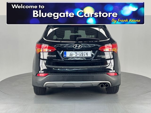 Image for 2016 Hyundai Santa Fe EXECUTIVE 4WD 4DR**7 SEATER**BLACK LEATHER INTERIOR**FRONT HEATED ELECTRIC SEATS**SEMI DIGITAL DASH**MULTIFUNCTIONAL STEERING WHEEL**DIGITAL MEDIA DISPLAY**REVERSE CAMERA**ELECTRIC HANDBRAKE**