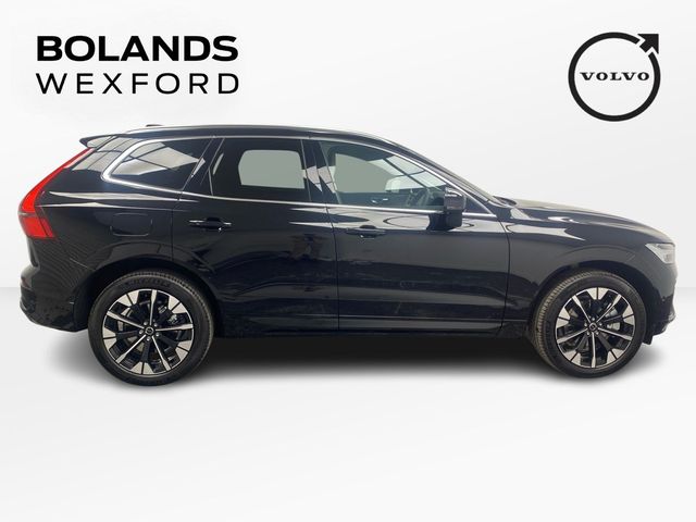 Image for 2026 Volvo XC60 Plus model in Onyx Black with the Cardamon interior