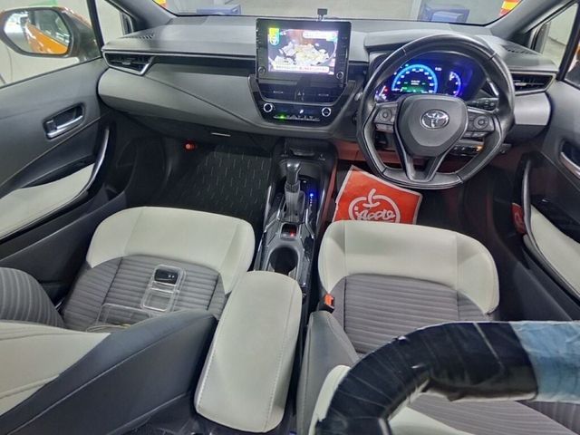 Image for 2021 Toyota Corolla 1.8 HYBRID TOURING WXB ESTATE - WHITE/GREY LEATHER INTERIOR - FACTORY ALLOYS - ADAPTIVE CRUISE CONTROL - TOYOTA SAFETY SENSE - REAR CAMERA - HEATED SEATS