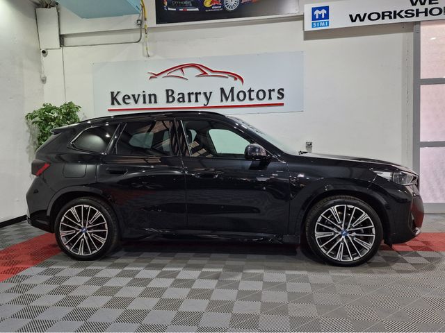 Image for 2023 BMW iX1 30 M SPORT (PRO PACK) X-DRIVE AUTOMATIC **ONE OWNER / 20" IND ALLOYS / ADAPTIVE LED HEADLIGHTS / COMFORT ACCESS / HARMAN KARDON SOUND / REVERSE CAMERA / WIRELESS PHONE CHARGING / BMW SERVICE PACK**
