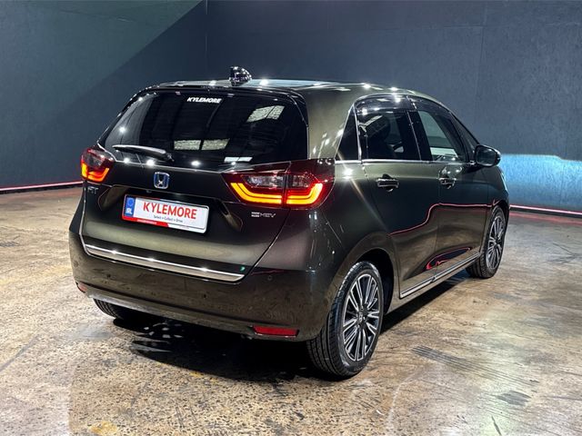 Image for 2021 Honda Fit 1.5 HYBRID LUXURY EDITION - BLACK HALF LEATHER - UPGRADED FACTORY ALLOYS - CRUISE CONTROL - HEATED SEAT - REAR CAMERA