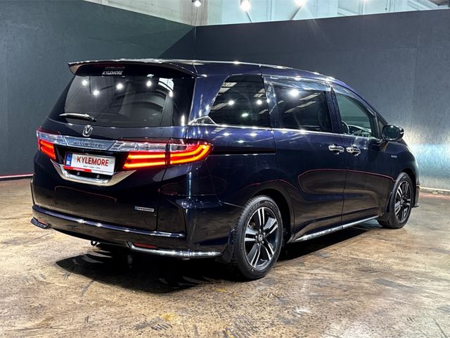 Image for 2016 Honda Odyssey 2.0 HYBRID AUTOMATIC 7 SEATER - FACTORY ALLOYS - BLACK LEATHER UPHOLSTERY - HEATED ELECTRIC SEATS - POWER SLIDING DOORS - 360/REVERSE CAMERA - CRUISE CONTROL