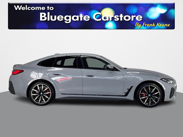 Image for 2024 BMW i4 EDRIVE35 M SPORT **FULL BLACK LEATHER AND SUEDE SEATS**LARGE TOUCHSCREEN INFOTAINMENT SCREEN**REVERSE CAMERA**FRONT AND REAR PARKING SENSORS**USB CHARGING PORT**APPLE CARPLAY**ANDROID AUTO**