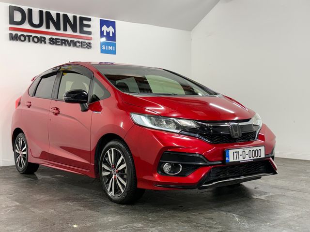 Image for 2017 Honda Fit **'S' PACKAGE**AUTO**HYBRID**KEYLESS ENTRY AND START**HONDA SENSING TECH**LED HEADLAMPS**16" MULTI SPOKE ALLOYS**SPORTS SEATS**APPLE/ANDROID CARPLAY**TOUCHSCREEN MEDIA**REVERSE CAMERA**FACTORY TINT**
