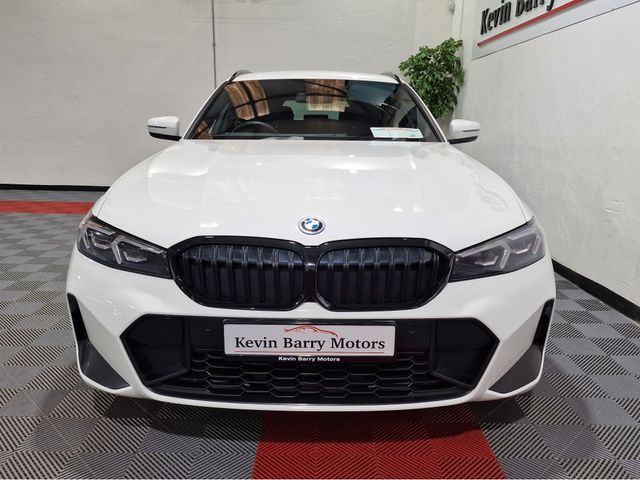 Image for 2022 BMW 3 Series 330E TOURING M SPORT (PRO PACK) LCI AUTOMATIC **ONE OWNER / TOP SPEC / 19" UPGRADED ALLOYS / APPLE CARPLAY / BMW M SEATBELTS / CRUISE CONTROL / ELECTRIC BOOTLID / SAT NAV / REVERSE CAMERA**
