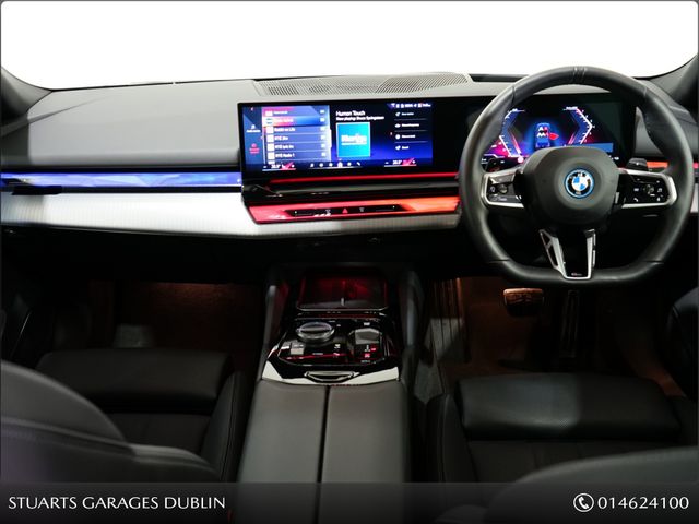 Image for 2026 BMW 5 Series 2 X PACKS AND PANORAMIC GLASS ROOF: TECH PLUS PACK, COMFORT PACK AND 20” 938 STAR ALLOYS, TANZANITE BLUE METALLIC WITH BLACK VEGANZA INTERIOR