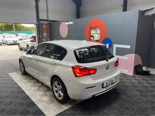 Image for 2018 BMW 1 Series €18950 2018 BMW 1 SERIES AUTOMATIC 118I 1.5L PETROL / 71K KMS / ADAPTIVE CRUISE CONTROL, HEATED SEATS, REVERSE CAMERA & MORE