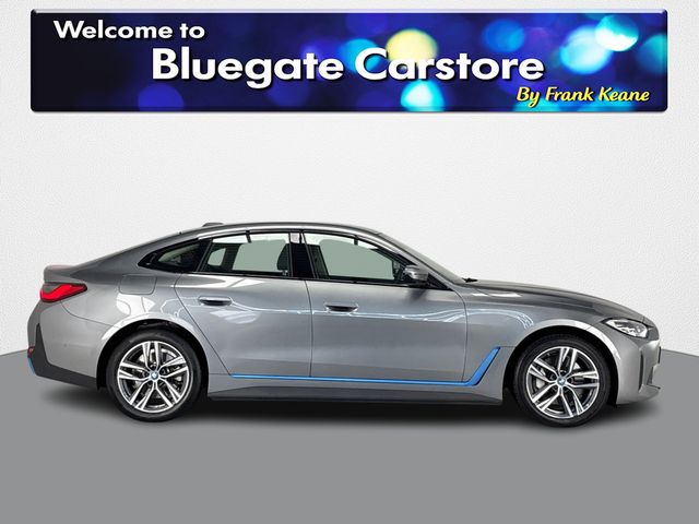 Image for 2024 BMW i4 EDRIVE35 SPORT**HARMON KARDON SOUND SYSTEM**HALF LEATHER INTERIOR**FRONT HEATED SEATS**REVERSE CAMERA**PARKING SENSORS**APPLE CARPLAY**DRIVE MODES**KEYLESS START**MULTIFUNCTIONAL STEERING WHEEL**