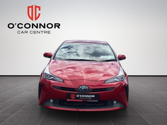 Image for 2019 Toyota Prius Red Prius energy — passing petrol stations like they offended you