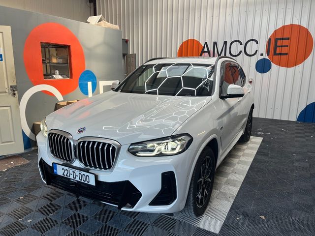 Image for 2022 BMW X3 2022 BMW X3 XDRIVE30E 2.0 AUTOMATIC / CRUISE CONTROL / PARKING CAMERA / ELECTRIC MEMORY & HEATED SEATS / AMBIENT LIGHTS / PANORAMIC SUNROOF AND MORE