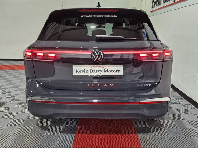 Image for 2024 Volkswagen Tiguan 1.5 PHEV ELEGANCE (19.7KWH BATTERY) 204BHP AUTOMATIC **ONE OWNER / APPLE CARPLAY / BLIND SPOT ASSIST / ELECTRIC BOOTLID / HEATED & MASSAGE SEATS / SAT NAV / REVERSE CAMERA / WIRELESS PHONE CHARGING**