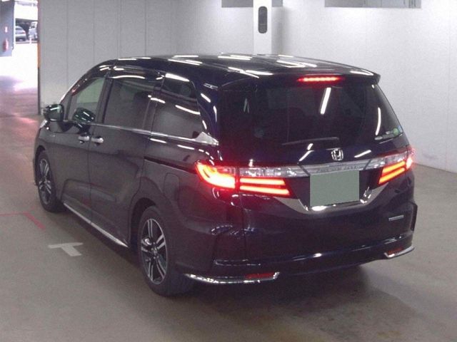 Image for 2016 Honda Odyssey 2.0 HYBRID AUTOMATIC 8 SEATER - FACTORY ALLOYS - BLACK LEATHER UPHOLSTERY - HEATED SEATS - POWER SLIDING DOORS - 360 CAMERA