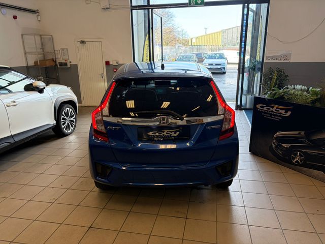 Image for 2014 Honda Fit 1.5 Petrol HYBRID 5DR AUTO. Immaculate Car with only 99km, 2 Keys, NCT done before collection, Mirror Link, Climate Control, Cruise Control, Full Electrics and much more.