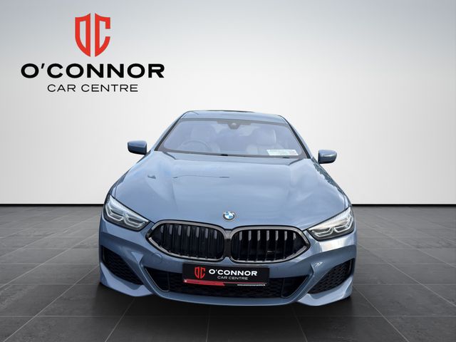 Image for 2021 BMW 8 Series Barcelona Blue, cream leather, big spec — this 840i is pure class.
