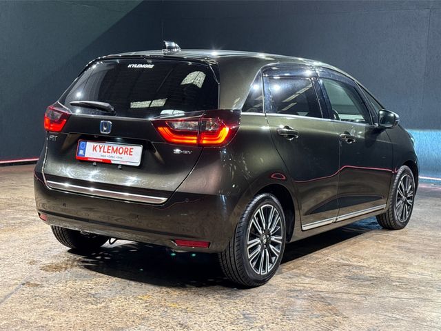 Image for 2021 Honda Fit 1.5 HYBRID LUXURY EDITION - BLACK HALF LEATHER - UPGRADED FACTORY ALLOYS - CRUISE CONTROL - HEATED SEAT - REAR CAMERA