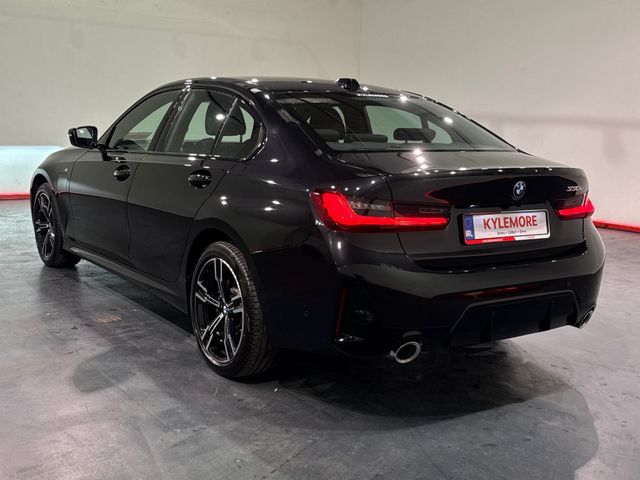Image for 2025 BMW 3 Series 330E BLACK SAPPHIRE M SPORT SALOON – 18’’ FACTORY ALLOYS – M PERFOMANCE TEX – CRUISE CONTROL - HEATED SEATS – DIGITAL DISPLAY – FLAT BOTTOM M SPORT STEERING WHEEL – REAR CAMERA/PARKING