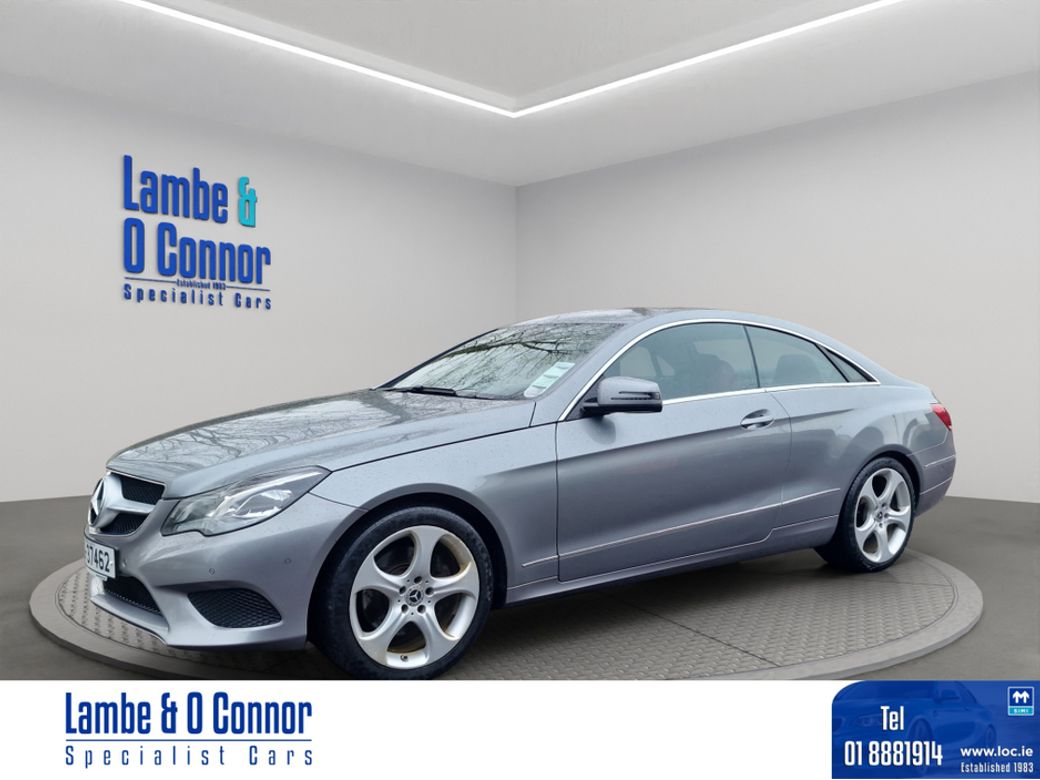 Image for 2015 Mercedes-Benz E Class E 220 AUTO COUPE * PALLADIUM SILVER METALIC / RED LEATHER * ACTIVE PARK ASSIST * HEATED SEATS * LOW MILEAGE WITH A DOCUMENTED SERVICE RECORD * BEST AVAILABLE * 