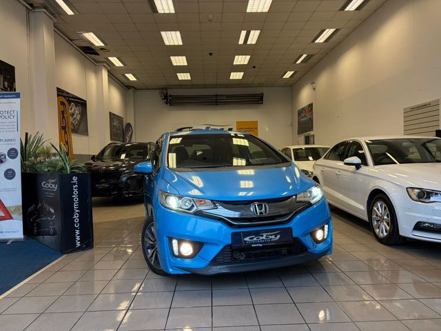 Image for 2014 Honda Fit 1.5 Petrol HYBRID 5DR AUTO. Immaculate Car with only 110km, 2 Keys, NCT done before collection, Mirror Link, Climate Control, Cruise Control, Full Electrics and much more.