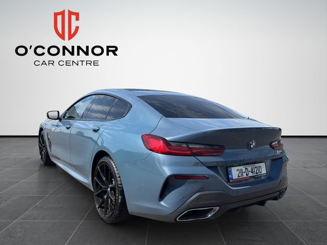 Image for 2021 BMW 8 Series Barcelona Blue, cream leather, big spec — this 840i is pure class.