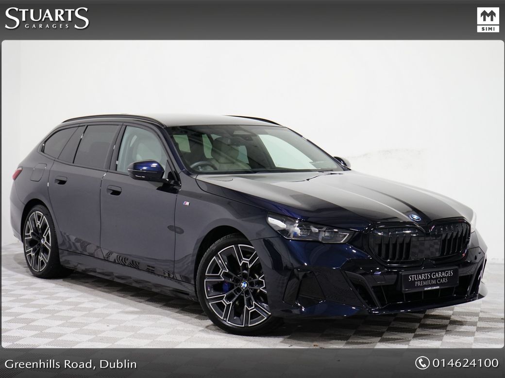 Image for 2025 BMW 5 Series *PANORAMIC SUNROOF, TECH PACK AND 20” ALLOYS* CARBON BLACK METALLIC WITH IVORY VEGANZA INTERIOR. 530e TOURING M-SPORT