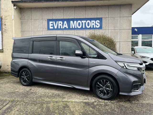 Image for 2019 Honda Stepwagon 7 SEATER SPADA G AUTOMATIC HYBRID 2.0 PETROL //LOW MILES//POWER SLIDING REAR DOORS//HALF LEATHER HEATED SEATS//ADAPTIVE CRUISE CONTROL//REVERSE CAMERA//KEYLESS ENTRY//