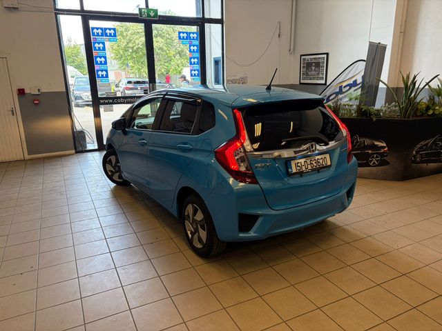 Image for 2015 Honda Fit 1.5 Petrol HYBRID 5DR AUTO. Immaculate Car with only 95km, 2 Keys, NCT done before collection, Mirror Link, Climate Control, Cruise Control, Full Electrics and much more.