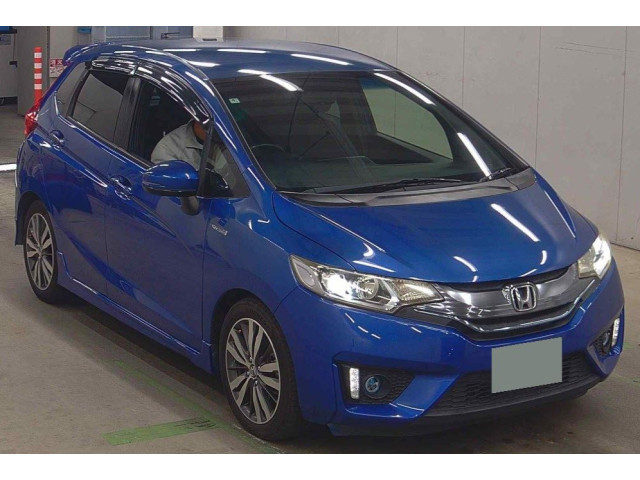 Image for 2014 Honda Fit Honda Fit Hybrid JDM 5-door hatchback with Honda’s efficient 1.5 petrol-hybrid system.