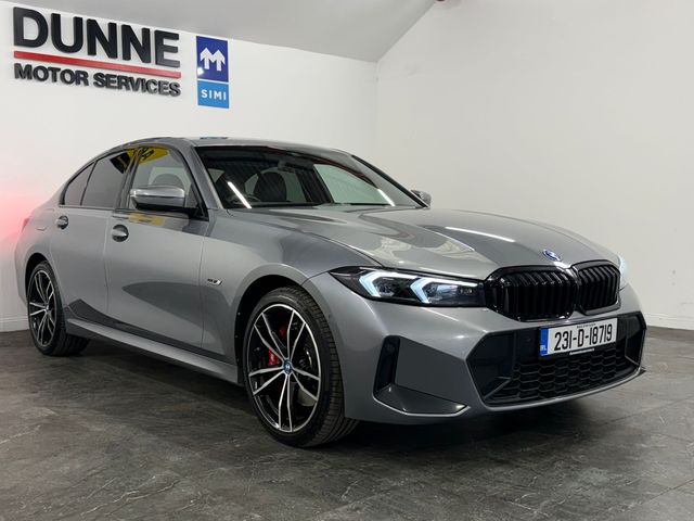 Image for 2023 BMW 3 Series **330E**M SPORT**292BHP**LCI HEADLIGHTS AND TAILIGHTS**WRAP AROUND DIGITAL DASH**APPLE CARPLAY**19'' DIAMOND CUT WHEELS**AMBIANT INTERIOR LIGHTING**HEATED HALF ALCANTARA HALF LEATHER SEATS**