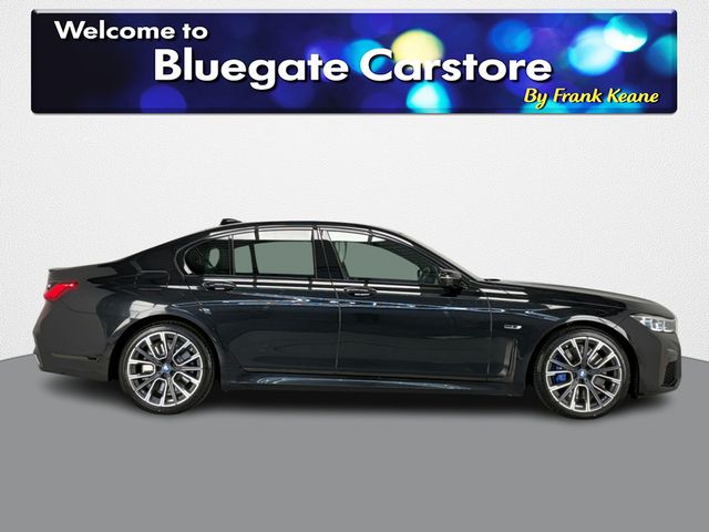 Image for 2022 BMW 7 Series 745E E LCI**PANORAMIC SUNROOF**HEATED MULTIFUNCTIONAL STEERING WHEEL**FRONT HEATED ELECTRIC SEATS**REAR HEATED SEATS**SOFT CLOSING DOORS**HARMON KARDON**APPLE CARPLAY**ELECTRIC TAILGATE**