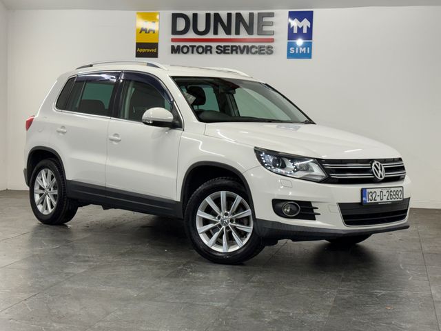 Image for 2013 Volkswagen Tiguan **TOUCHSCREEN BLUETOOTH RADIO **REVERSING CAMERA **REVERSING SENSORS **AUTO START STOP **ELECTRIC HANDBRAKE **AUTO HOLD **AUTO HEADLIGHTS **DUAL CLIMATE CONTROL **FACTORY WIND DEFLECTORS **POWER FOLD