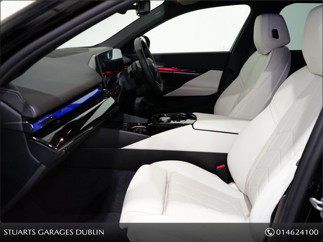 Image for 2025 BMW 5 Series COMFORT PACK, TECH PACK AND 20” ALLOYS* SAPPHAIRE BLACK METALLIC WITH IVORY VEGANZA INTERIOR.