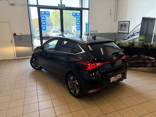 Image for 2022 Hyundai i20 Deluxe Plus 5DR Manual. Only 11km TAX & NCT, 2Keys, Reverse Camera, MFSW, Cruise Control, Mirror Link, Rear Parking Sensors, Alloy Wheels, Air Conditioning, Folding Rear Seats, and more.