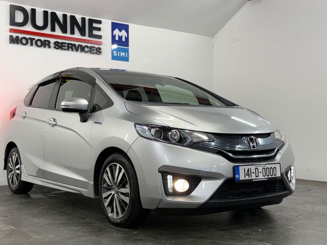 Image for 2014 Honda Fit **S PACKAGE**SIDE SKIRTS**REAR SPOILER**16"DIAMOND CUT ALLOYS**XENON HEADLAMPS**LED DAYTIME RUNNERS**KEYLESS ENTRY AND START**TOUCHSCREEN MEDIA**ANDROID/APPLE CARPLAY**REVERSE CAMERA**AUTO LIGHTS**