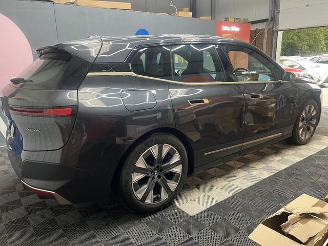 Image for 2022 BMW iX 2022 BMW IX AUTOMATIC / CRUISE CONTROL / PARKING CAMERA / ELECTRIC MEMORY & HEATED SEATS / HEATED STEERING WHEEL / APPLE CARPLAY AND MORE