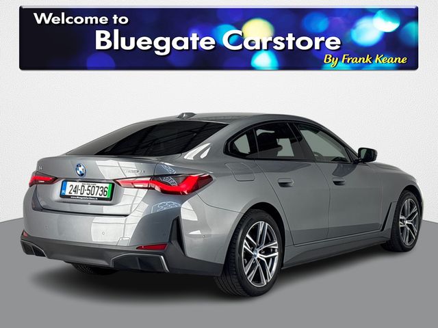 Image for 2024 BMW i4 EDRIVE35 SPORT**HARMON KARDON**HALF LEATHER INTERIOR**FRONT HEATED SEATS**REVERSE CAMERA**ELECTRIC HANDBRAKE**PARKING SENSORS**APPLE CARPLAY**HEADS UP DISPLAY**DRIVE MODES**FINANCE ARRANGED**