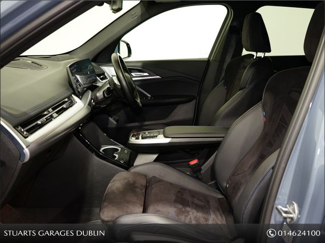 Image for 2023 BMW iX1 30e X-DRIVE M-SPORT *PRO PACK WITH TECH PACK AND COMFORT PACKS*: FINISHED IN STORM BAY METALLIC WITH BLACK HALF LEATHER, 20” DIAMOND CUT ALLOYS. 