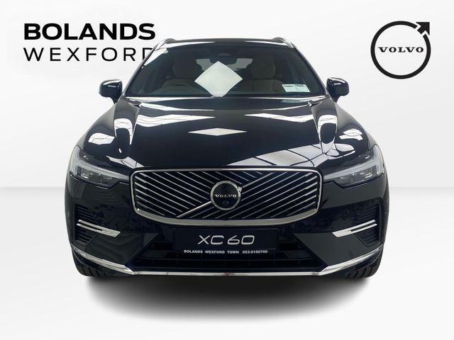Image for 2026 Volvo XC60 Plus model in Onyx Black with the Cardamon interior