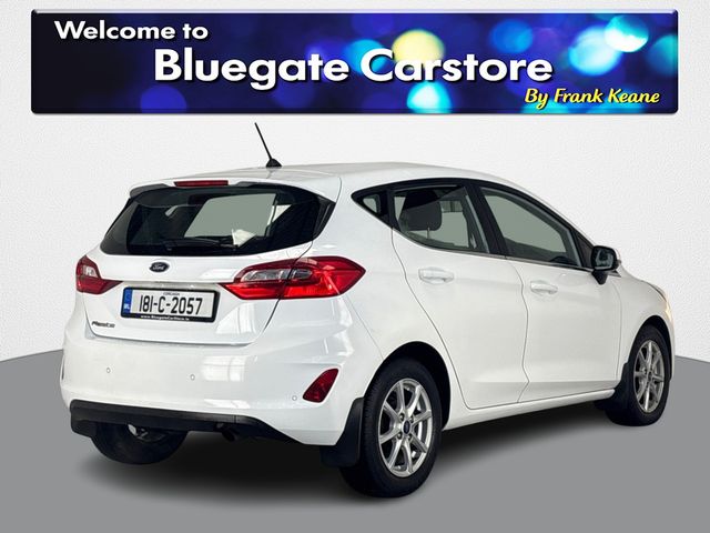 Image for 2018 Ford Fiesta TITANIUM 1.1 85PS 5M **FULL BLACK CLOTH INTERIOR**BLUETOOTH AUDIO**TOUCHSCREEN INFOTAINMENT SCREEN**SEMI DIGITAL DASH**MANUAL HANDBRAKE**LANE KEEPING ASSIST**A/C**SPEED LIMITER**USB CHARGING PORT**